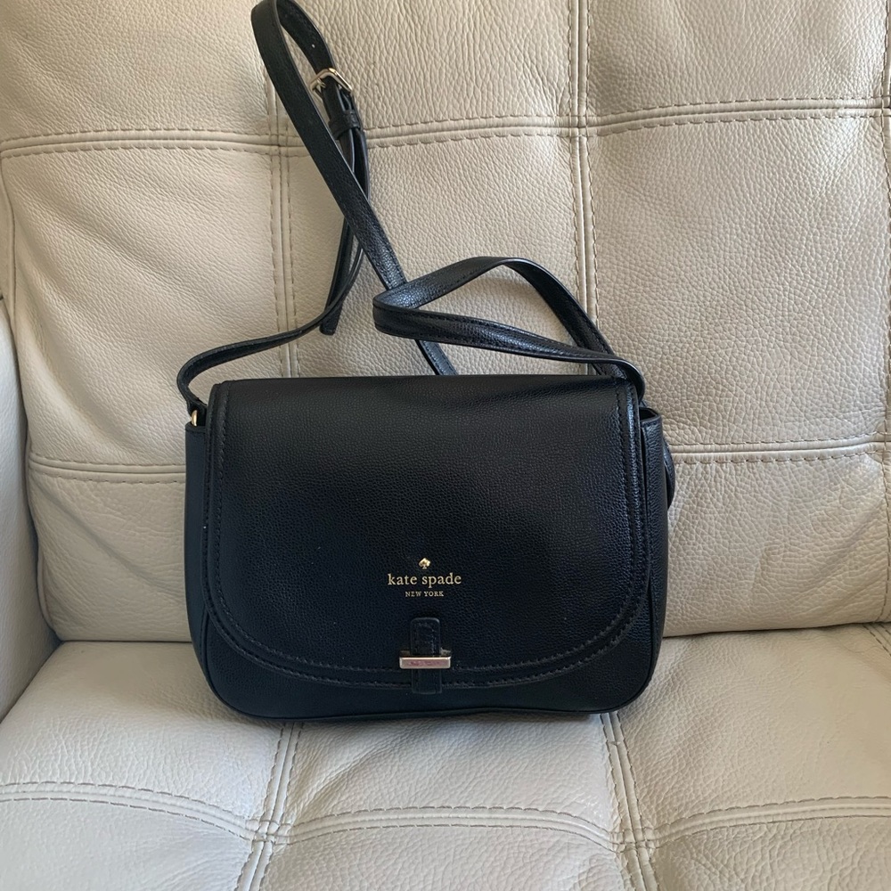 Kate sprade Small Black Leather Cross Body
8.5"L x 9.5"W x 6.5"H